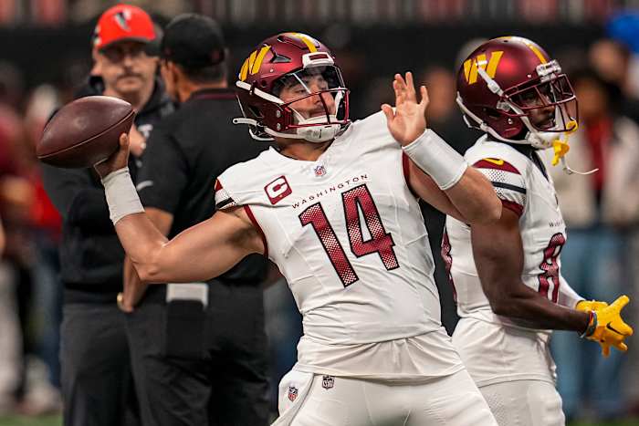 Washington Commanders quarterback Sam Howell (14) warms up on the field prior to the game against the Atlanta Falcons at Mercedes-Benz Stadium. Mandatory Credit: Dale Zanine-USA TODAY Sports